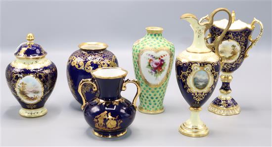 A Coalport three handled cup, a ewer, a pot pourri vase and cover, a Doulton vase and two others